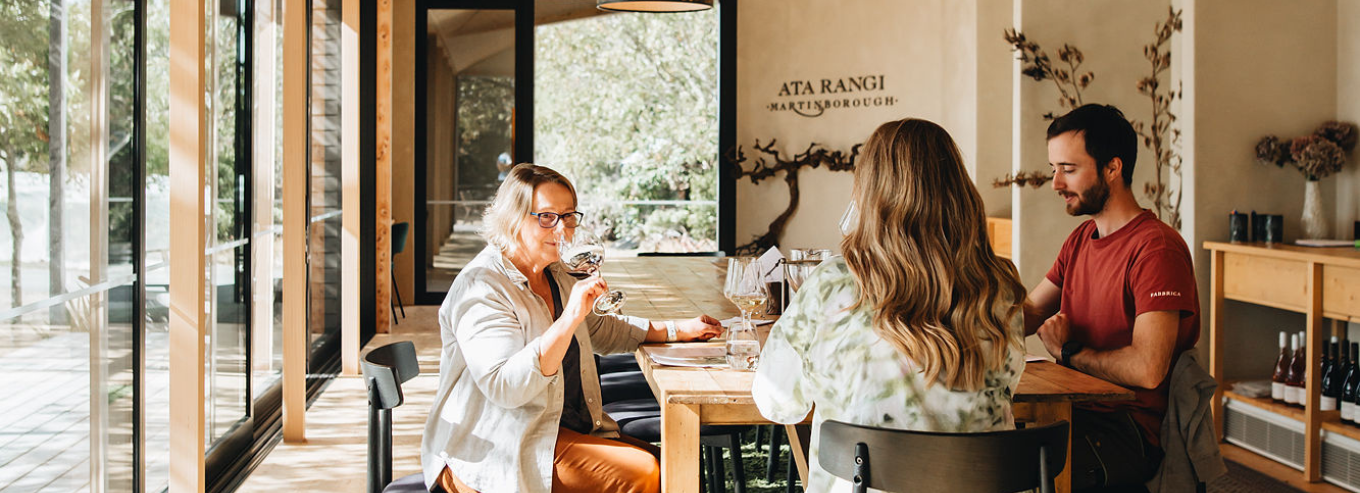 People enjoying wine at Ata Rangi